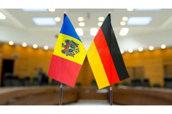 DOVADĂ FOTO // Moldoveni stabiliți în Germania sau trezit că au fost înregistrați prealabil în Federația Rusă