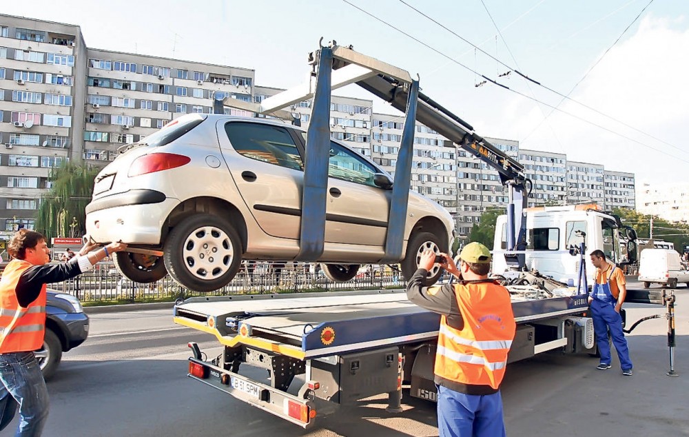 DOC // Câți bani vor fi obligațiți să achite șoferii al căror mașini parcate neregulamentar for fi evacuate de poliție