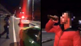 Imagini HILARE cu un BMW fără de o roată oprit de poliție. Șoferul a coborât cu berea în mână