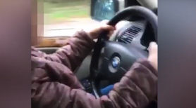 Un tată și-a filmat copilul minor la volanul BMW-ului și a plasat imaginile pe internet