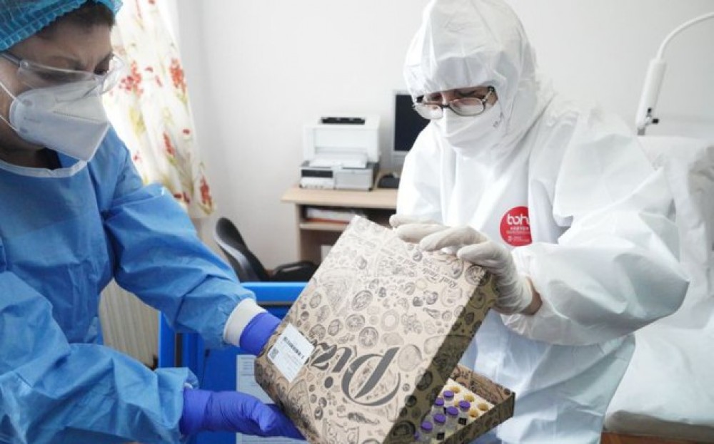 Vaccinul Pfizer distribuit în România în cutii de Pizza. Explicațiile coordonatorului campaniei de vaccinare