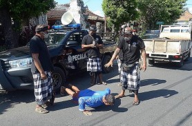 Turiştii din Bali prinşi fără mască sanitară sunt obligaţi să facă flotări sau să măture strada, dacă spun că nu au bani de amendă