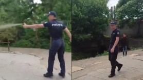 VIDEO // Polițist din Chișinău filmat cum pulverizează gaze lacrimogene spre doi bărbați în piața SH de la Gara Feroviară