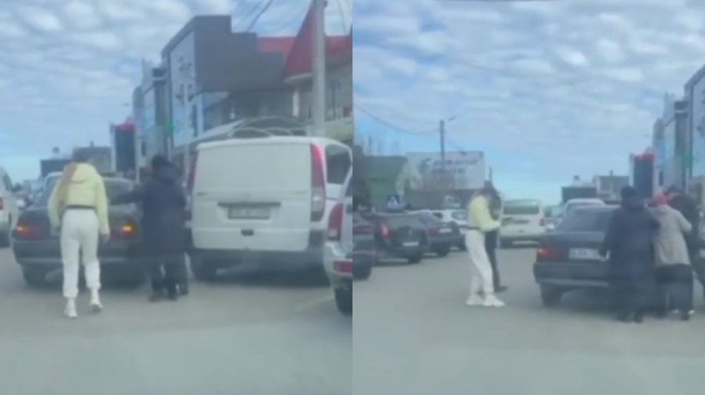 VIDEO // Un bărbat amenințat cu pistolul de o femeie în plină stradă la Comrat. De la ce ar fi pornit cearta