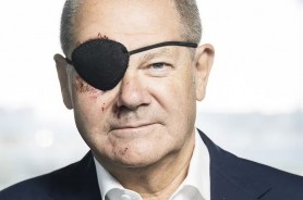 FOTO // Avalanşă de glume după ce Olaf Scholz a apărut cu un petic la ochi