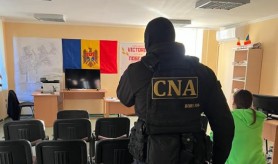 Percheziții în mai multe localități din Nisporeni și Strășeni în două cauze penale pornite pe faptul coruperii electorale