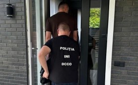 Alte zece percheziții în Republica Moldova în dosarul centrului de apel implicat în fraude informatice